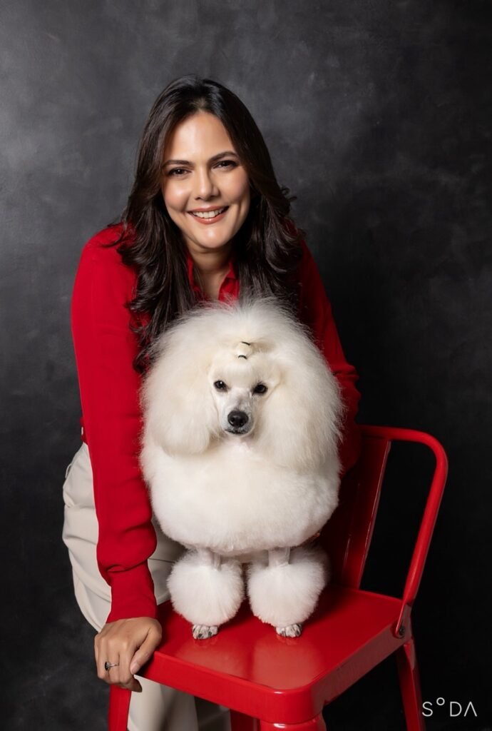 Andrea Cyrill Khurana with a white Samoyed