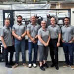 ZAHORANSKY USA team during the company's 20th anniversary Open House in West Chicago with the Z.PUMA brush manufacturing machine.