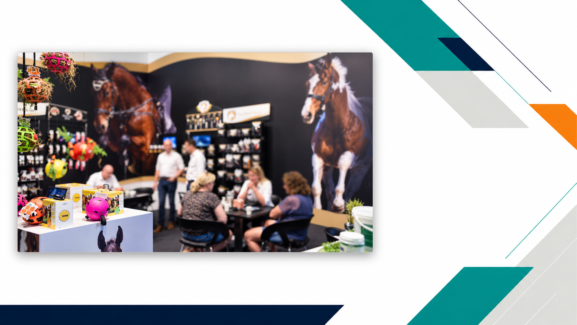 Spoga horse trade fair booth showcasing horse care products and equestrian equipment